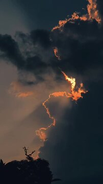 Dramatic Dark Storm Clouds with Golden Silver Lining Sun Edge