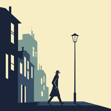 Man walking alone on a city street at night under a street lamp.