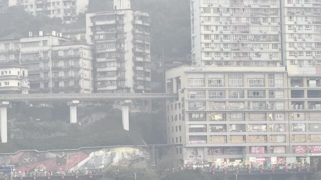 January 13, 2026, Liziba, Yuzhong District, Chongqing, China: A rail transit train passes through the Liziba Station.