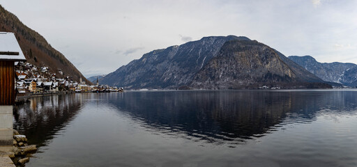 Panoramic view of the Village of Hallstatt in Austria reflected on Lake