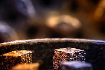 Studio close-up of medical cannabis flower and preparation details, including texture and plant material processing, presented in controlled lighting for healthcare, research, and alternative medicine