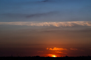 Obraz premium Silhouette of cityscaper buildings during a sunset in Brazil