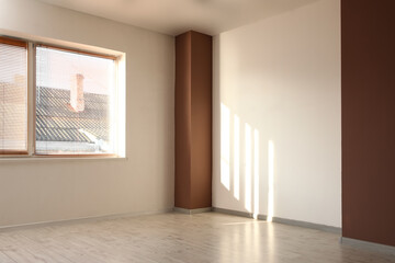Obraz premium View of big stylish empty room with window