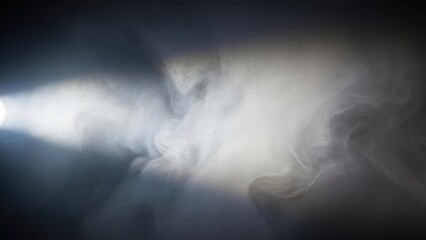 Obraz premium Mysterious light beam penetrating thick smoke in a dark atmosphere