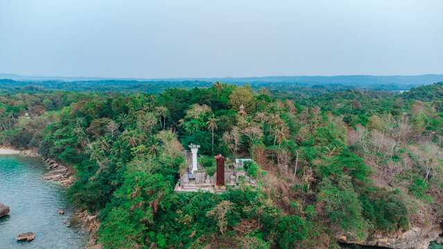 Echoes of Modernity: Abandoned Coastal Guisi Lighthouse Ruins Reclaimed by Tropical Forest In Nueva Valencia, Guimaras, Philippines