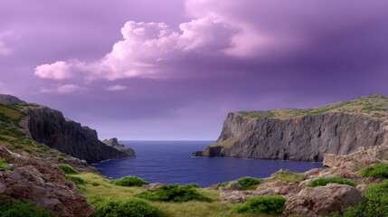 Scenic Coastal View with Rocky Cliffs and Calm Ocean Under a Dramatic Purple Sky during Golden Hour