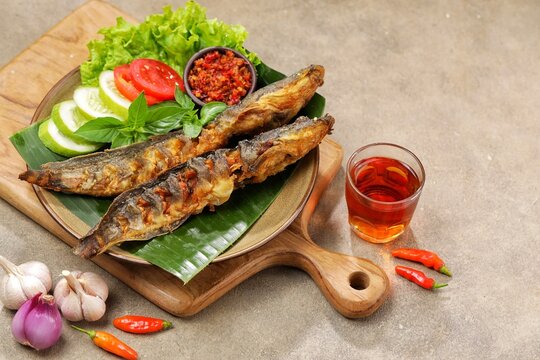 Pecel lele or pecek lele or penyetan is a typical East Javanese food, consisting of catfish and tomato sauce.
