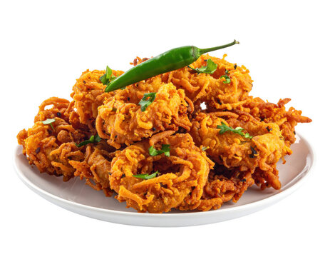 A plate of crunchy onion pakoras (piyaju) with green chili, isolated on white background.