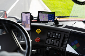 Truck driver uses GPS and mobile apps for navigation in Pleasant Grove California during a long...