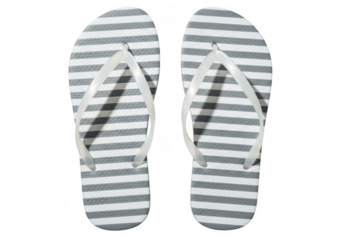 Pair of gray and white striped flip flops with white straps on the feet isolated on transparent background
