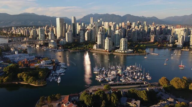 Wide Aerial shot of Downtown Vancouver false creek Yaletown on sunny day