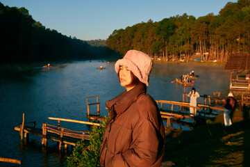 A Thai woman at "Pang Ung" a major tourist destination in northern Thailand known for its cold weather and beautiful natural scenery, located in Mae Hong Son province.