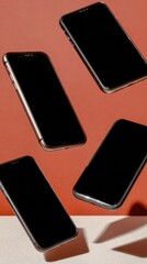 Black smartphones floating in rotated positions with blank screens for app mockup in minimalist tech aesthetic studio setting