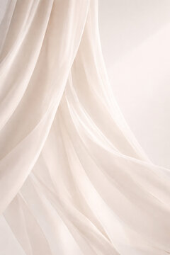 Softly draped translucent white fabric with gentle folds and ethereal light.