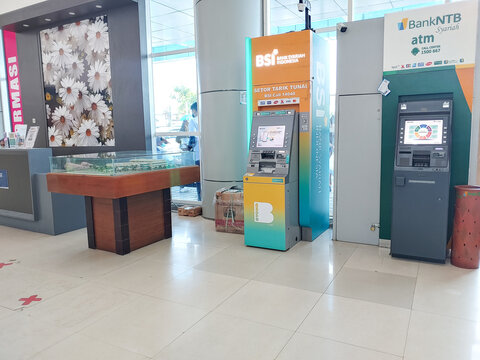 Close up of atm machine, BSI and NTBs bank atm machine at Mataram Citys hospital 