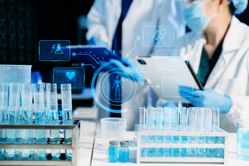 Medical scientists using digital technology and AI tools for laboratory research and diagnostics. Healthcare innovation, biotechnology, data-driven medicine