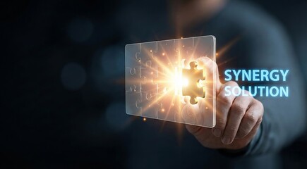 Synergy solution concept, hand touching glowing puzzle piece on virtual interface, blue digital background of business cooperation and team strategy, ideal for merger, connection, and problem solving.