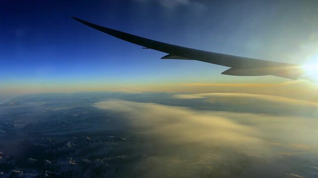 Greenland Ice Caps North Pole Polar Airplane wing passenger window seat Denmark Canada Iceland Europe aerial view Autumn morning afternoon sunset sunrise Dreamliner Boeing 787 great circle navigation