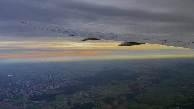 Airplane wing window seat Munich Duetschland Europe aerial view Autumn morning afternoon sunset sunrise Dreamliner Boeing 787 Bavarian Alps valley plains Franz Josef Strauss International Airport