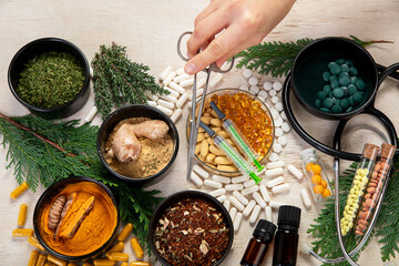 Alternative medicine herbal organic capsule. Herbs leaf natural supplements for healthy good life.