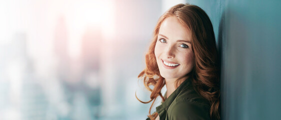 Happy, woman and portrait of teacher by wall with confidence for education career with knowledge. Smile, banner and female educator with pride for job development in city with mockup space in London.