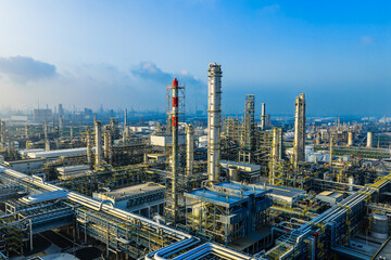 Aerial view of a large chemical plant and oil refinery with pipeline equipment in industrial area