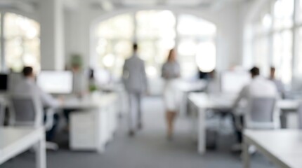 A bustling modern open-plan office is blurred, with employees moving and working at their desks, conveying dynamic activity and productivity.