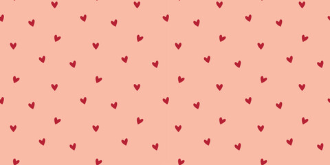 Minimalistic seamless pattern with hearts. Beige background with tiny red hearts. Cute print for textiles, wallpaper, packaging, tiles, paper, design, vector graphics © Iry