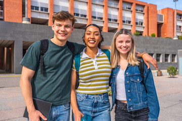 Diverse university students smiling together on campus