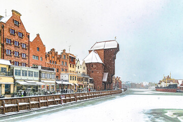 Beautiful ancient houses on the Motlawa river embankment in Gdansk at winter 