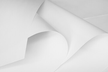 Sheets of white paper in black and white.