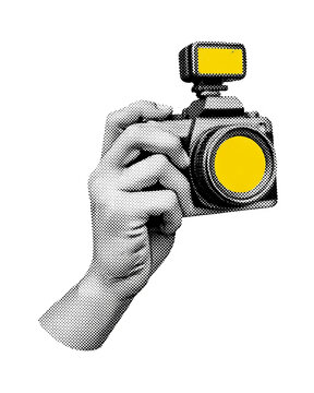 Human hand holding a DSLR camera isolated on white background, representing photography, creative profession, and visual media concept.