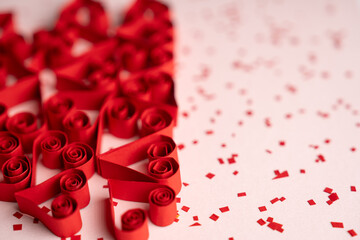 Paper Heart Scatter in Left Side on Pink Background with Confetti