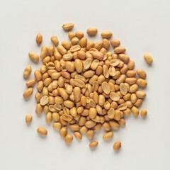 Fototapeta premium Raw shelled peanuts with split kernels spread on light surface closeup natural nut snack protein food rustic photography image