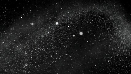 Gray particles floating in black space with white specks and a dark background