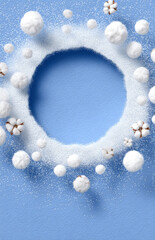 Light blue background with white snow and ice circle frame, cotton flower accents, and textured surface for winter-themed design