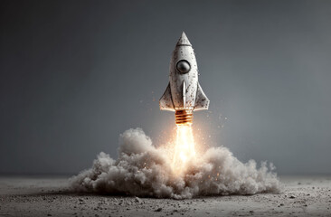 Light bulb with a metallic surface and textured finish resembling a rocket engine, emitting bright flames and smoke during launch, symbolizing innovation and technological