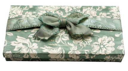 Green gift box with a decorative bow on a white background isolated