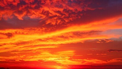 Fiery Sunset Sky - Dramatic Orange and Red Clouds Painting the Horizon with Vibrant Hues.
