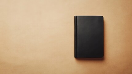 Black Leather Notebook on Khaki Background, Minimalist Neutral Style for Office and Journaling.