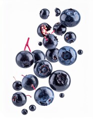 Fresh blueberries floating in the air, a vibrant display of healthy fruit, isolated on white background.