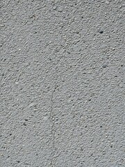 Obraz premium Roughcast textured wall background with fine aggregate concrete, close-up