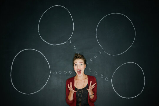 Portrait, chalkboard or woman with thought bubbles, surprise or new ideas on dark background. Expression, shocked or person with reaction, solution or wow with brainstorming, problem solving or space