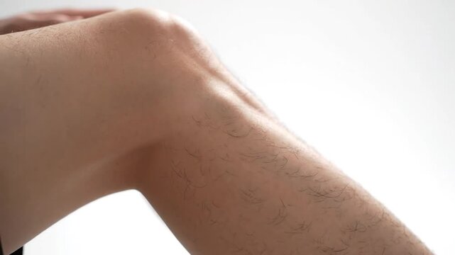 Close-up of a hairy leg with knee