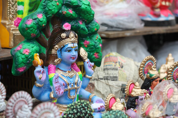 Universal teacher God Dakshinamurthy doll for Sale at a Market