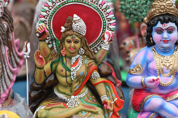 Fototapeta premium Arthanareeswarar dolls in shop for golu festival