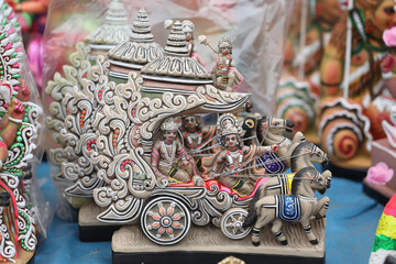 Lord Krishna and Arjuna on Chariot  dolls for Sale at a Market