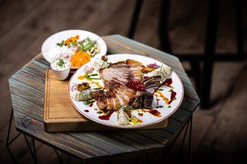 Sliced grilled beef steak served on a plate, juicy meat texture and perfect doneness visible, appetizing food photography for restaurant menu, food advertising and commercial use.