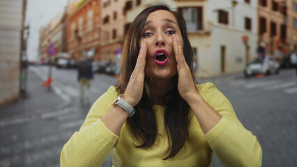 Woman gesturing passionately on bustling street showing her vibrant personality and expressive...
