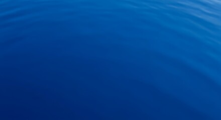 Deep blue ocean water with gentle waves